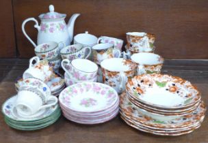 A Grafton tea set decorated with pink flowers, a Spode tea set and a Wellington china part tea