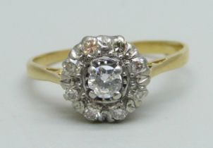 An 18ct gold and diamond cluster ring, 2.4g, N