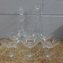 A set of six etched glass drinking glasses and two decanters including one crystal **PLEASE NOTE