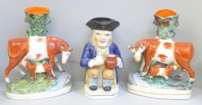 A pair of Staffordshire porcelain spill holders and a Toby jug **PLEASE NOTE THIS LOT IS NOT