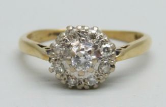 An 18ct gold diamond cluster ring, 3g, O