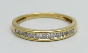 An 18ct gold half eternity ring, 0.25ct, 1.9g, M