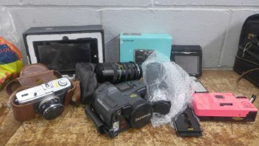Cameras, lenses, mobile phone, touchpad II tablet, etc. **PLEASE NOTE THIS LOT IS NOT ELIGIBLE FOR