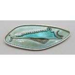 An abstract design sterling silver enamelled brooch/pendant depicting a fish, maker's mark de P.