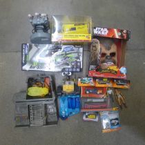 A box of assorted toys, including a Radio Control Trotter's Van, RC Air Striker Helicopter, Action