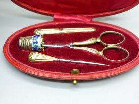 A continental silver gilt neccessaire, set in case