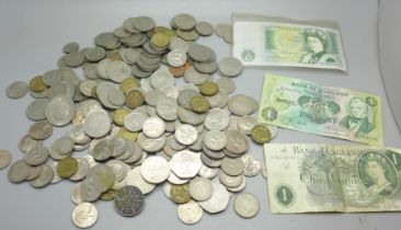 A collection of British coins and bank notes