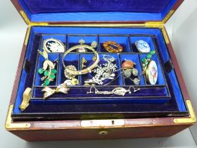 A leather covered jewellery box and vintage jewellery