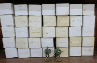 A collection of metal German military figures, Waffen SS in camo smock, boxed (37)