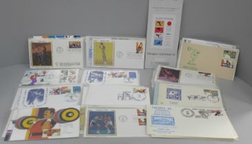 A collection of commemorative stamp covers; 100 assorted Olympics, Los Angeles and Lake Placid,