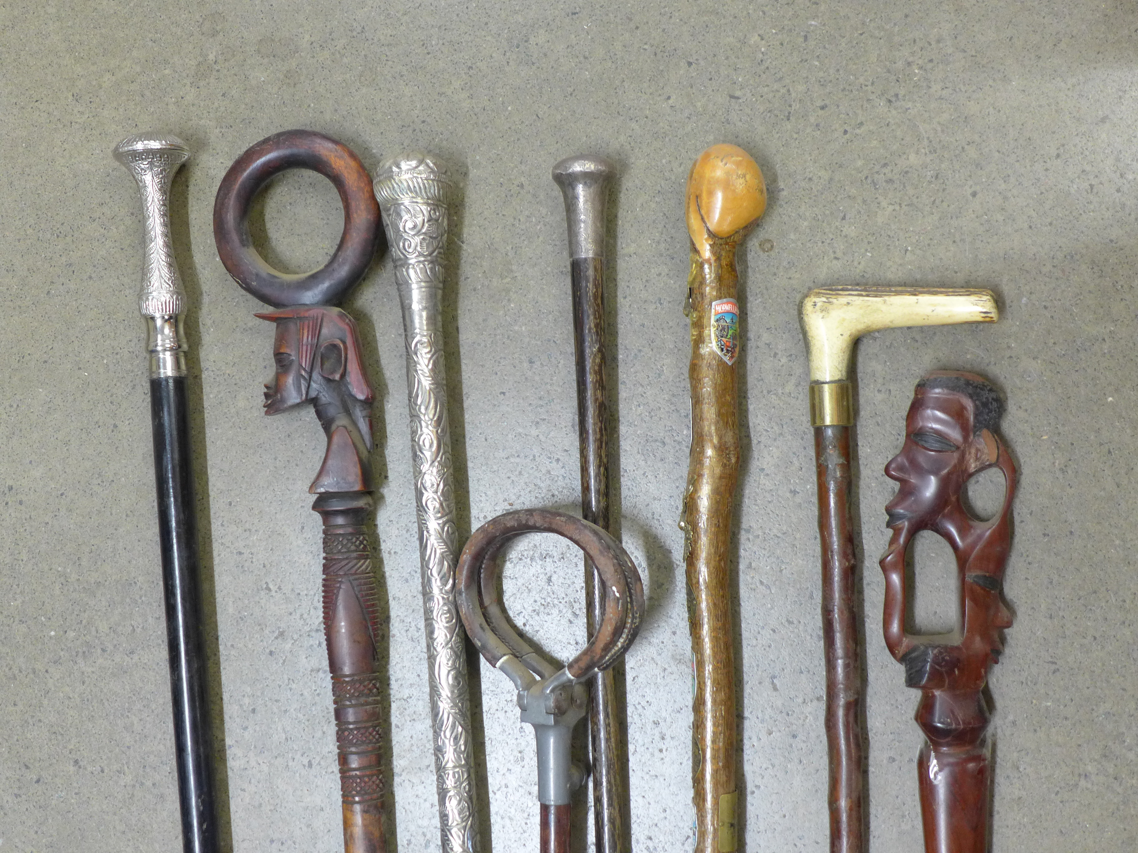 A collection of seven walking sticks including one with silver top and a shooting stick **PLEASE - Image 2 of 8