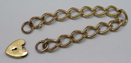 A rolled gold on metal core curb chain bracelet and padlock