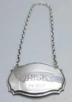 A silver whisky label
