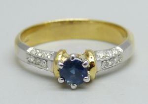 An 18ct gold, sapphire and diamond ring, 18 diamonds on three sides of shoulders, 4.1g, P/Q