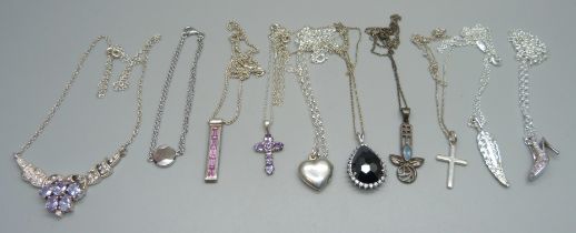 Eight sterling silver necklaces and pendants, a silver bracelet and an unmarked white metal leaf