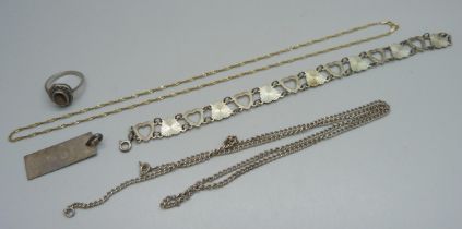 A fine 9ct gold chain, 1.5g, and silver jewellery including a ring, ingot, bracelet and a chain, 19g