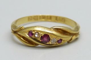 An 18ct gold, diamond and garnet ring, 1.7g, N