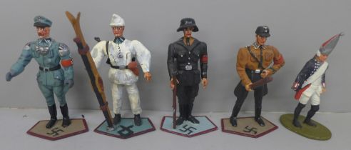 A collection of assorted metal German military figures, various designs