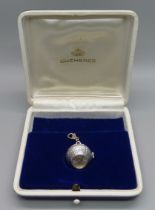 A Bucherer ball pendant watch in original box