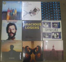 Ten sealed LP records