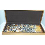 A large wooden box containing over 110 various knobs and screws to fit teapots, coffee pots, dishes,