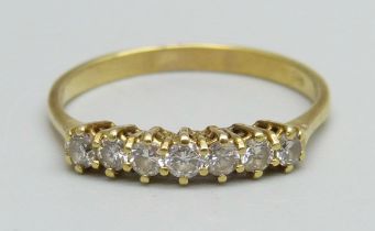 An 18ct gold and seven stone diamond ring, 2.3g, Q