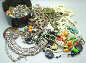 A collection of costume jewellery including earrings, necklaces, etc.