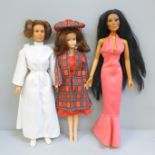 Three dolls, Emma Peel 1960s Avengers TV, Princess Leia Star Wars and Cher