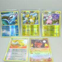 Five vintage reverse holographic Pokemon cards