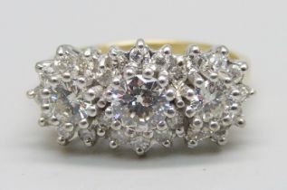 An 18ct gold, 27 stone diamond ring, London 1987, three central diamonds measure 1ct in total,