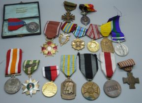 A collection of medals including a Queen Elizabeth II For Faithful Service Medal to Walter Stanley
