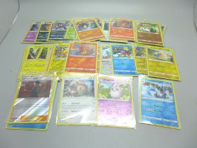 50 Holographic/reverse holographic Pokemon cards