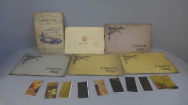 A box of cigarette cards and albums