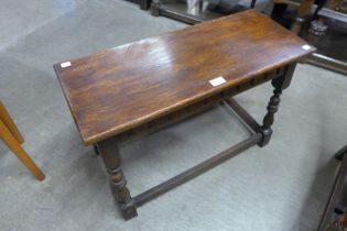 A 17th Century style oak stool