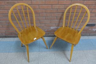 A pair of Ercol Blonde elm and beech Windsor chairs