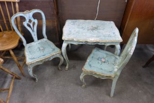 An Italian style painted occasional table and two chairs