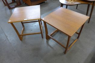 A pair of teak occasional tables