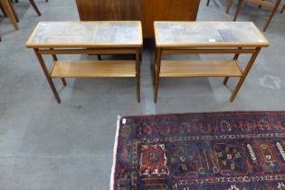 A pair of Danish teak and tiled top coffee tables