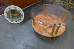 A faux red marble and glass topped circular coffee table and a mirror