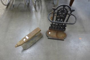 A Victorian style cast steel stick stand and a cast iron anvil
