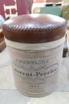 A leather topped Laurent Perrier stool