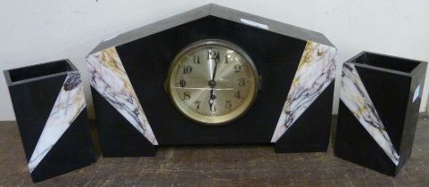 A French Art Deco black slate and marble clock garniture