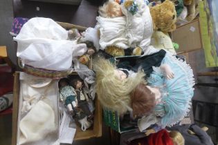 Four boxes of vintage and later dolls, porcelain etc.