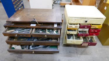 A watchmaker's tool cabinet and another tool cabinet