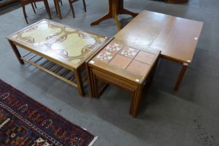 A teak and tiled topped coffee table, a tiled top nest of tables and two teak coffee tables