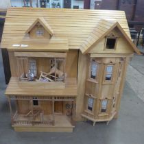 A large wooden doll's house