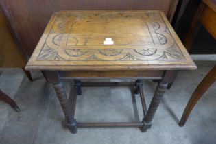 A carved beech bobbin turned occasional table