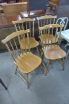 A set of four beech kitchen chairs