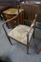 An Edward VII inlaid mahogany elbow chair