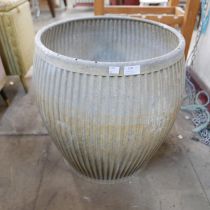 A galvanised dolly tub